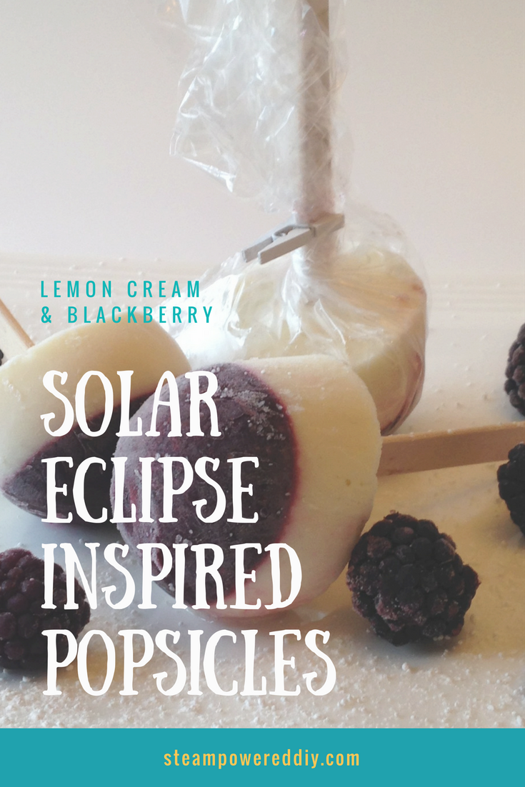 Photo of Lemon Cream & Blackberry Popsicles inspired by the solar eclipse